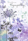 This sympathy card unfolds like a soft-spoken condolence delivered on a still evening in St Paul's Cray, when words are few but feeling runs deep. The artwork features a scattering of tall, fine wildflower stems, each crowned with tiny umbelliferous blooms that fan out like miniature fireworks frozen in midair. Their outlines are drawn with delicate precision, washed in gentle shades of lavender, violet, cool indigo, and silvery green that melt into one another. The flowers rise from a base of misty watercolour, where pale purple and quiet blue drift together, giving the impression of a distant meadow blurred by tears or early morning fog. Light seems to filter softly across the scene, not from any visible source, but as a diffuse glow that keeps every element calm and subdued. Around the blossoms, several butterflies hover and turn, their wings barely tinted in lavender and soft blue, semi-transparent as if they could vanish with a sigh. They introduce a subtle note of hope and transformation, the way a small detail in a funeral spray can gently lift the heart. The background holds no sharp boundaries, only soothing gradients that feel as tranquil as looking across local green spaces at dusk. This quiet composition suggests both fragility and resilience, offering a respectful pause in the midst of grief. It feels perfectly suited to accompany a thoughtful sympathy bouquet delivered to a family in St Paul's Cray, extending comfort and remembrance through nature's most tender shapes and colours.